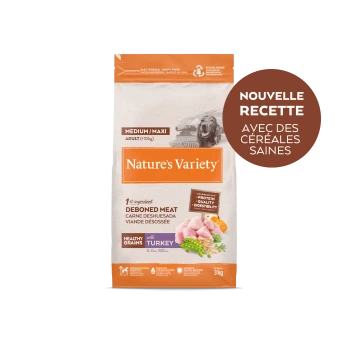 Nourriture pour chiens adultes Nature's Variety Medium/Maxi avec viande désossée, céréales saines et dinde, sac de 3 kg avec texte en français.