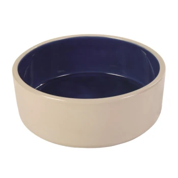 Ceramiczna miska dla zwierząt z kremowym zewnętrzem i głębokim niebieskim wnętrzem, o gładkim, okrągłym kształcie.