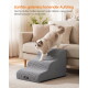 Katze auf grauen, strukturierten Haustiertreppen neben einem beigen Sofa; sichtbarer Text: 'Sanfter, gelenkschonender Aufstieg' und Feandrea-Label.