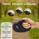 Eine Hand hält eine schwarze, ausziehbare Hundeleine mit Funktionssymbolen und Text: "Halten. Stoppen. Loslassen." Vorteile aufgelistet.