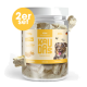 Glas mit KAUDAS gefriergetrockneten Käse-Hundeleckerlis (150g) für Training und Belohnungen, mit einem verspielten Hund, hergestellt in Deutschland.