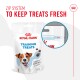 Royal Canin Training Treats package featuring a happy dog, labeled "Tasty Chews Low Calorie," with a zip system for freshness.