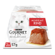 Verpackung von Purina Gourmet Revelations Katzenfutter mit einer flauschigen weißen Katze, mit einem Mousse-Gericht, das "Mousse mit Rind" beschriftet ist, und zwei 57g Portionen.