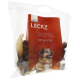 Sac transparent de friandises pour chiens "LECKY" avec un chien souriant, étiqueté "Kalbsöhrli mit Muschel" et "Qualité Suisse."