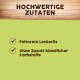 Anzeige für Haustierleckerlis mit 'HOCHWERTIGE ZUTATEN' oben und Häkchen für 'Fettarme Leckerlis' und 'Ohne Zusatz künstlicher Farbstoffe' auf grünem Hintergrund.