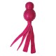 Bright pink pet toy with a glittery round top and long ribbon-like tails, designed for playful interaction.