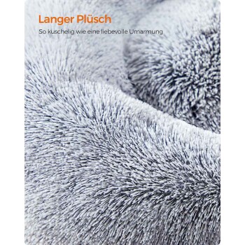 Nahaufnahme von grauem Langplüschstoff mit Text 'Langer Plüsch, So kuschelig wie eine liebevolle Umarmung'