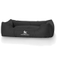 Schwarzes Hundebett mit gepolstertem Design, ausgestattet mit dem Logo 'KNUFFELWUFF' und einer Silhouette eines Hundes.