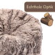 Nahaufnahme eines Baumstumpf-Tierverstecks mit realistischer Rindenstruktur, sichtbarem Text 'Echtholz Optik' und kleiner Baumstamm-Illustration.