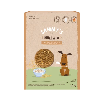 Emballage pour les Müsli Taler de Sammy, présentant un chien de dessin animé, un grand biscuit muesli, et un texte sur les ingrédients : épeautre, orge, avoine, blé, maïs.