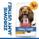 Torba z karmą dla psów Hill's Science Plan Oral Care z psem, z tekstem 'ZDROWIE JAMY USTNEJ' i 'z KURCZAKIEM'.