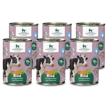 Sechs Dosen Knuffelwuff Tiernahrung mit einer Kuh-Illustration, beschriftet mit "75% Rind mit Kartoffeln und Petersilie," hypoallergen und getreidefrei.