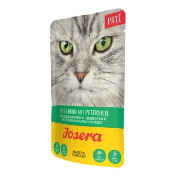 Nassfutter Katze, Adult, Paté, Ente und Huhn 16x85 g Katzenfutterbeutel mit einer Nahaufnahme des Gesichts einer Katze, beschriftet mit "Josera Paté" und "Ente & Huhn mit Petersilie" in grüner Schrift.