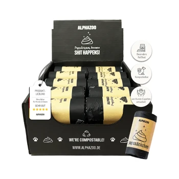 Eine schwarze Box mit der Aufschrift "ALPHAZOO" enthält Rollen mit kompostierbaren Haustierabfallbeuteln, mit dem Text "Pysztakuren, denn SCHEISSE PASSIERT!" sichtbar.