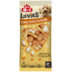 8in1 Lovies Cheesy Chicken Dumbbells Leckerli-Packung mit lächelndem Hund und herzförmigem Fenster, das hantelförmige Leckerli zeigt.