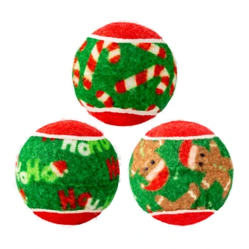 Three festive tennis balls for dogs with red, green, and white patterns featuring candy canes, "Ho Ho Ho" text, and gingerbread men.