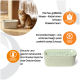 Rotgetigerte Katze neben keramischem Trinkbrunnen; sichtbarer Text: 'FRESH, FILTERED WATER', 'COMPACT DESIGN', 'NON-PLASTIC DRINKING'.
