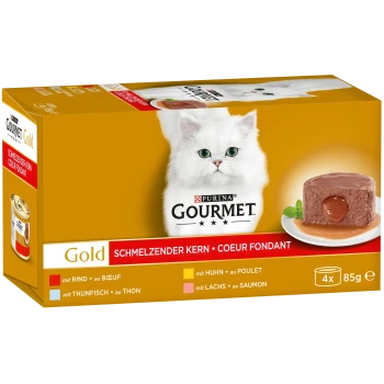 Gourmet Gold Katzenfutterbox mit einer weißen Katze mit grünen Augen, enthält vier 85g Portionen, die Geschmäcker umfassen Rind, Huhn, Thunfisch und Lachs.