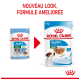 Image de deux sachets de nourriture pour chiots Royal Canin côte à côte, présentant un nouveau look et une formule améliorée. Le texte indique 'NOUVEAU LOOK, FORMULE AMÉLIORÉE.'