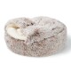 Rundes, flauschiges beige-cremefarbenes Haustierbett mit weichem Plüsch-Innenraum, ideal für kleine Hunde oder Katzen.