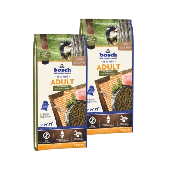 Zwei Taschen Bosch Adult Hundefutter, jeweils 15,0 kg, mit frischem Geflügel und Hirse, mit Nährstoffdetails und einem Hundebild.