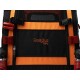 Schwarze und orange Hundetransportbox mit Netzpaneelen, mit dem Logo "DogBus by TrendPet" und reflektierenden Sicherheitslichtern.