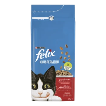 Un sac bleu de nourriture pour chats Purina Felix Knuspermenü, mettant en avant un chat noir et blanc joueur à l'avant, avec des morceaux de croquettes éparpillés autour.