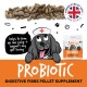 Cartoon-Hund als Krankenschwester mit Glas und Haufen brauner Pellets; Etikett 'PROBIOTIC' und Abzeichen 'Formulated by vets Made in the UK'