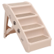 Eine Haustiertreppe mit vier Stufen, mit beigen, mit Teppich bezogenen Tritten und dekorativen Pfotenabdrücken und Knochenmotiven an den Seiten.