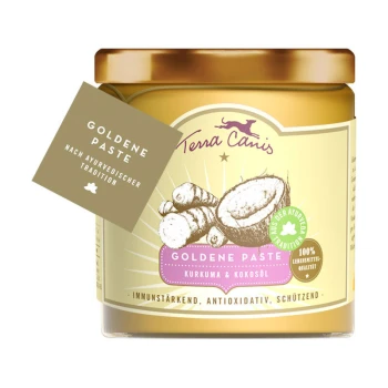Goldene Paste 250ml Ein Glas Terra Canis Goldene Paste mit Kurkuma und Kokosöl, mit einem Etikett, das "Goldene Paste nach ayurvedischer Tradition" liest.