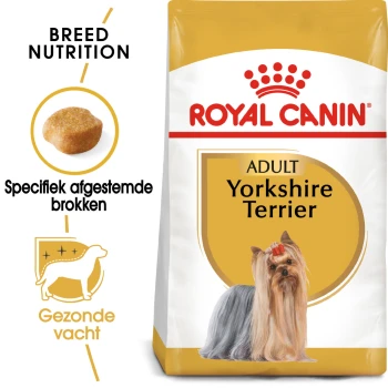 Royal Canin Adult Yorkshire Terrier hondenvoer zak met een Yorkshire Terrier met een strik, die voeding specifiek voor het ras en een gezonde vacht benadrukt.