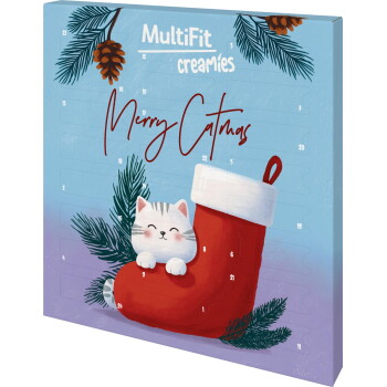 Kalendarz adwentowy z uśmiechniętym kociakiem w czerwonej świątecznej skarpecie i gałązkami sosny; napis "MultiFit creamies" i "Merry Catmas".