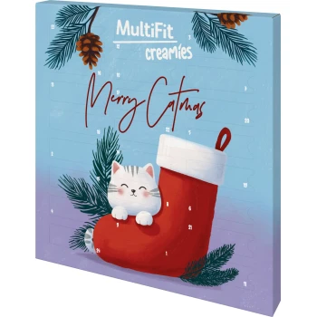 Kalendarz adwentowy z uśmiechniętym kociakiem w czerwonej świątecznej skarpecie i gałązkami sosny; napis "MultiFit creamies" i "Merry Catmas".