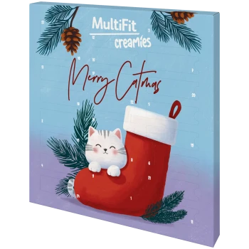 Calendrier de l'Avent avec un chaton souriant dans une chaussette de Noël rouge et des branches de pin ; texte « MultiFit Creamies » et « Merry Catmas ».