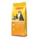 Gelbe Tüte JosiDog Economy Adult Hundefutter mit Bildern von drei Hunden und Text in Deutsch, Englisch und Französisch.