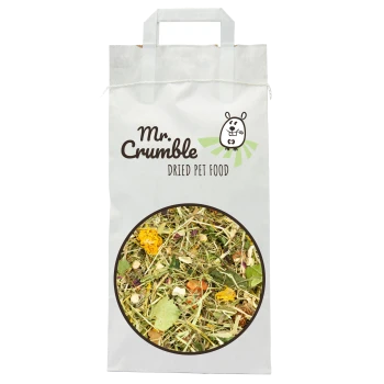 Weiße Tüte mit der Aufschrift 'Mr. Crumble Dried Pet Food' mit einem runden Fenster, das gemischte getrocknete Kräuter und Blumen zeigt.