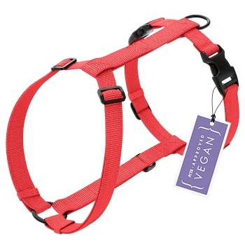 - Hundegeschirr Vegan PureControl rot XS Rotes Haustiergeschirr mit verstellbaren Riemen und schwarzen Clips, mit einem Etikett, das "PETA Approved Vegan" liest.