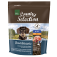 Sac de nourriture pour chiens marron étiqueté "Real Nature Country Selection" avec un fond pittoresque, mettant en avant la saveur "Scandinavie" pour les petits chiens adultes.