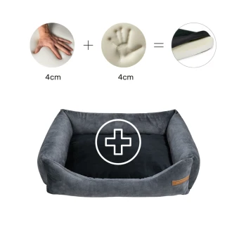 Ein plüschiges, graues Haustierbett mit einem schwarzen Kissen, das ein Pluszeichen-Icon und Illustrationen zeigt, die einen Handabdruck und Maße von 4 cm zeigen.