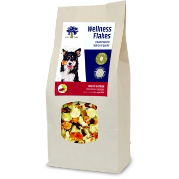 Tüte Blue Tree Wellness Flakes für Haustiere, die bunte getrocknete Wurzelgemüse und einen Hund auf dem glutenfreien Etikett zeigt.