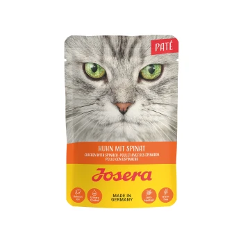 Nassfutter Katze, Adult, Paté, Huhn mit Spinat 16x85 g Katze Futterbeutel zeigt eine Nahaufnahme einer grünäugigen Katze. Text: "Huhn mit Spinat", "Josera", plus Icons für Lachsöl und Harnwegskontrolle.