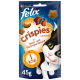 Katzenleckerlipackung mit Felix Crispies, mit einer verspielten Katzenillustration, die "Mit Rind- und Hühnergeschmack" und "1 kcal pro Snack" angibt.