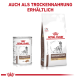 Dosen- und Trockenfutter für Hunde von Royal Canin, beschriftet mit "Gastrointestinal High Fibre," mit einem veterinärmedizinischen Ernährungsthema.