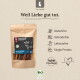 Liebesgut-Braunbeutel mit Bio-Rind-Hundesnacks, Slogan „Weil Liebe gut tut.“ Symbole: Glutenfrei, Getreidefrei, Laktosefrei, Single-Protein.