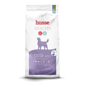 Futtersack 'Husse Selected Hypoallergenic Flexcare Adult' — weiß mit lila Hundesilhouette, beschriftet mit '12 kg | 26,4 lbs' und 'Approved by vets'.