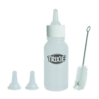 Clear plastic pet feeding bottle with a white cap, two silicone nipples, and a cleaning brush, labeled "TRIXIE."