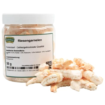 Trockenbarf Riesengarnelen 150 g Ein Glas mit gefriergetrockneten Riesengarnelen, beschriftet mit "Masterfeed Riesengarnelen" und Nährwertanalysedetails, umgeben von Garnelenstücken.