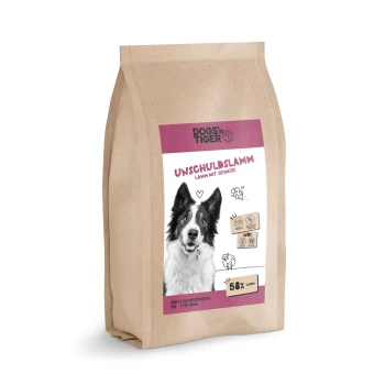 Unschuldslamm 2 kg Braune Papiertüte mit Hundefutter, beschriftet mit 'UNSCHULDSLAMM Lamm mit Gemüse', mit einem Border Collie auf der Vorderseite, der 58% Lamm angibt.