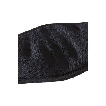 Nahaufnahme eines schwarzen Haustierpflegehandschuhs mit strukturiertem Oberflächen für effektive Fellentfernung.