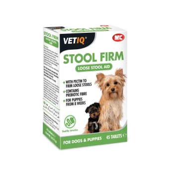 Box of VETIQ Stool Firm Loose Stool Aid for dogs and puppies, featuring two dogs on the front, with 45 tablets and claims of prebiotic fiber.